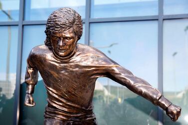The newly unveiled statue of George Best outside Winsdor Park in Belfast. PA