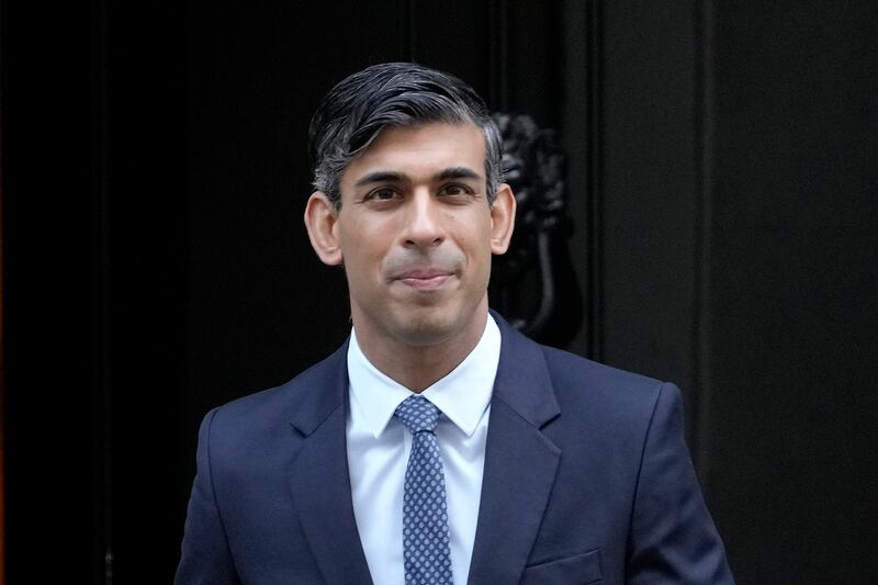 Britain's Prime Minister Rishi Sunak leaves 10 Downing Street to attend the weekly session of Prime Ministers Questions in Parliament. AP