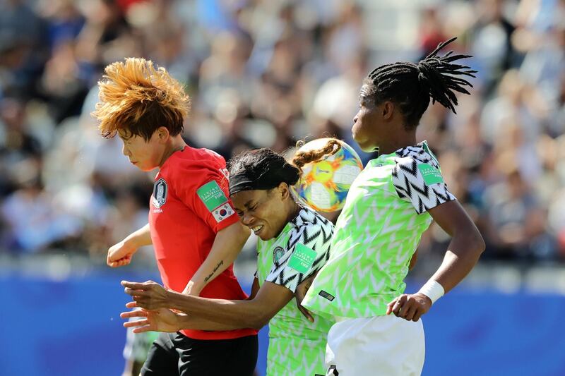 Ngozi Ebere and Osinachi Ohale of Nigeriain action. Getty Images