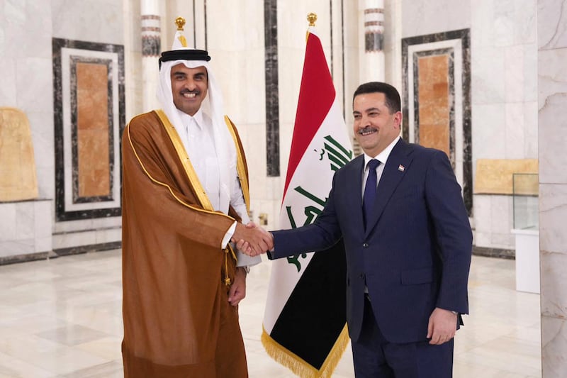 Iraqi Prime Minister Mohammed Shia Al Sudani welcomes Sheikh Tamim, Emir of Qatar, to Baghdad. AFP