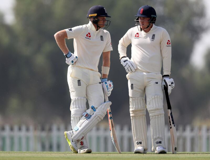 Abu Dhabi, United Arab Emirates - November 18, 2018: England's Sam Billings and Dom Bess (R) bat in the game between Pakistan A and the England Lions. Sunday the 18th of November 2018 at the Nursery Oval, Zayed cricket stadium, Abu Dhabi. Chris Whiteoak / The National
