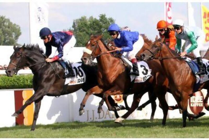 Buzzword, second from left, is pictured on his way to winning the German Derby.
