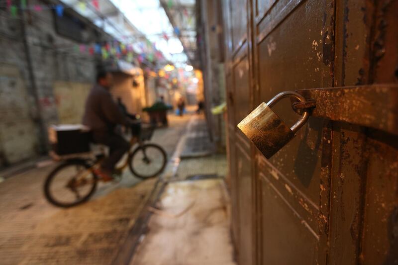 Locked doors in Nablus. Alaa Badarneh / EPA