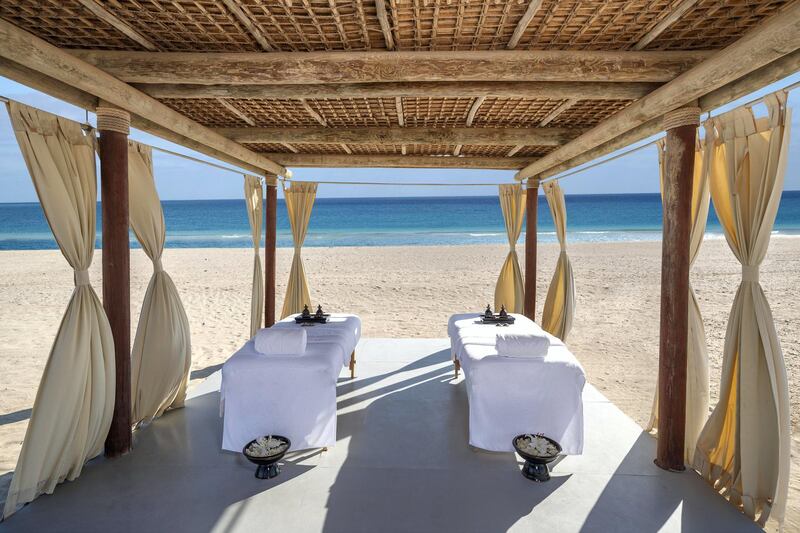 Couples' treatments on the beach at Anantara Al Yamm Villa Resort.