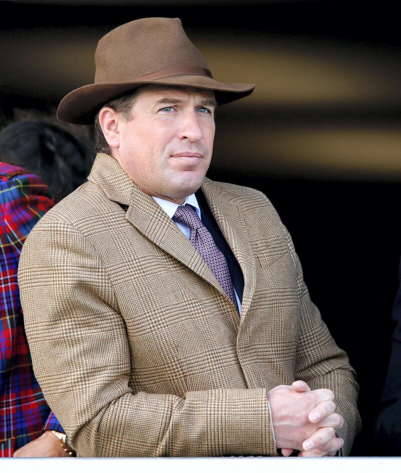 CHELTENHAM, UNITED KINGDOM - MARCH 13: (EMBARGOED FOR PUBLICATION IN UK NEWSPAPERS UNTIL 24 HOURS AFTER CREATE DATE AND TIME) Peter Phillips watches the racing as he attends day 4 'Gold Cup Day' of the Cheltenham Festival 2020 at Cheltenham Racecourse on March 13, 2020 in Cheltenham, England. (Photo by Max Mumby/Indigo/Getty Images),