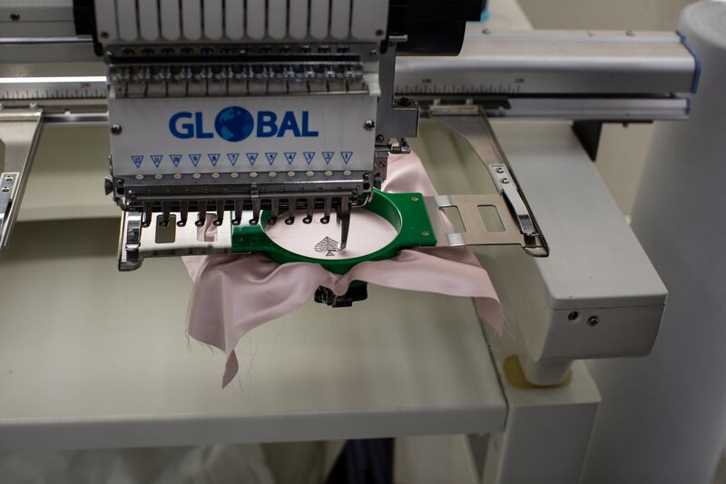 The embroidery machine is put to work on the factory floor at Diamony.