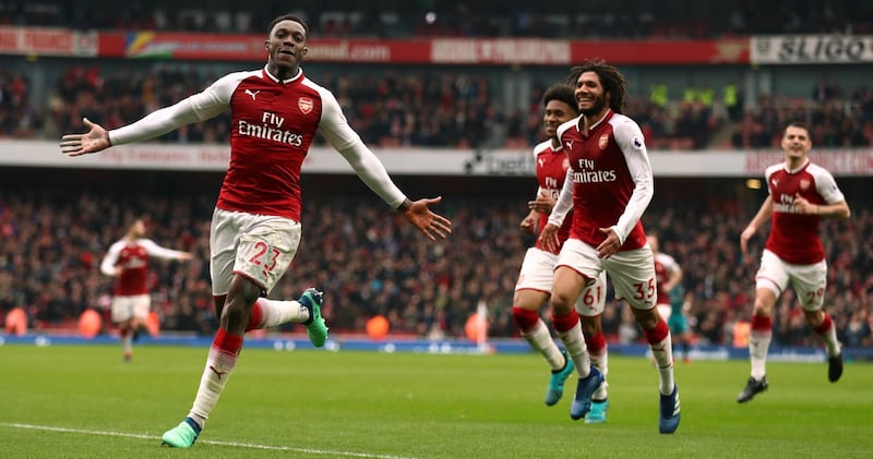 Arsenal's Danny Welbeck, left, celebrates scoring his side's second goal of the game, during the English Premier League soccer match between Arsenal and Southampton at the Emirates Stadium, in London, Sunday April 8, 2018. (Tim Goode/PA via AP)