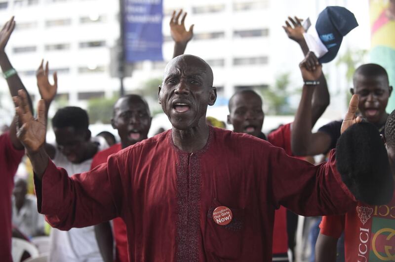 A father of one of the missing school girls prays for the release of the remaining 112 kidnapped Chibok schoolgirls ahead of the fourth anniversay of their kidnapping during a vigil in Lagos on April 13, 2018.
Nigeria will mark on April 14, the fourth anniversary of the mass abduction of 219 schoolgirls by Boko Haram jihadists who raided their secondary school in Chibok, northeast Nigeria. / AFP PHOTO / PIUS UTOMI EKPEI