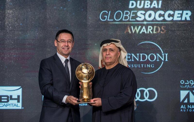 Barcelona president Josep Maria Bartomeu accepts the award for 'Best Club of the Year' awarded to FC Barcelona on Sunday at the Globe Soccer Awards in Dubai. Reuters
