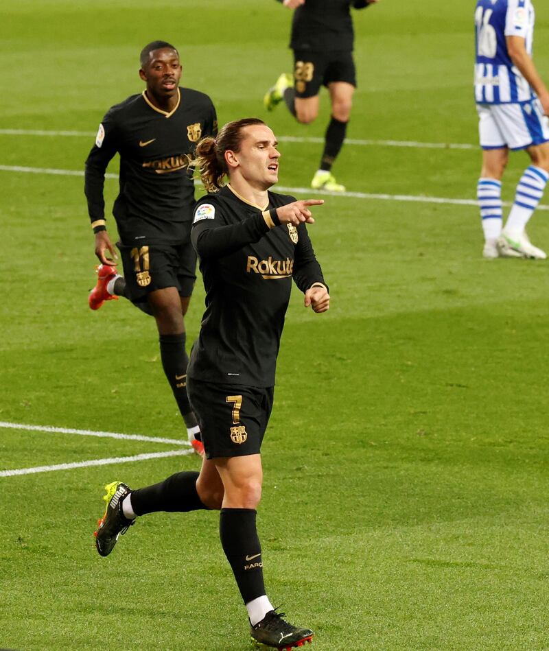 Barcelona's French striker Antoine Griezmann celebrates after scoring the opening goal against Real Sociedad. EPA