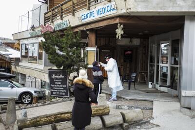 epa08318285 Medical staff at work outside of a medical center of the ski resort during the coronavirus disease (COVID-19) outbreak in Verbier, Switzerland, 24 March 2020. Countries around the world are taking increased measures to stem the widespread of the SARS-CoV-2 coronavirus which causes the Covid-19 disease.  EPA/LAURENT DARBELLAY PICTURE TAKEN WITH A DRONE