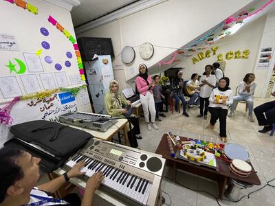 The centre's band. which helps young refugees with music therapy sessions. Khaled Yacoub Oweis / The National