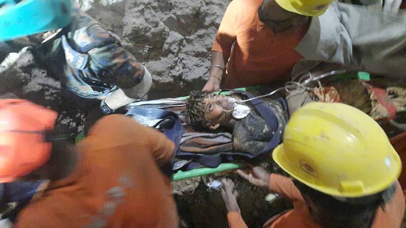 More than 500 people helped to dig a 21-metre tunnel to reach him.