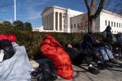 People queue outside the US Supreme Court in Washington hoping to hear the arguments on Donald Trump's eligibility to run for president. AP