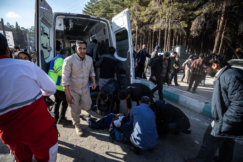 Emergency services arrive at the site where two explosions struck a crowd marking the anniversary of the 2020 killing of Iranian military leader Maj Gen Qassem Suleimani in Kerman, Iran. AFP