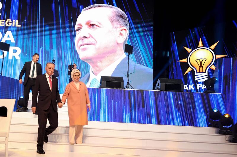Turkish President Recep Tayyip Erdogan and his wife Emine Erdogan during the unveiling of his Justice and Development Party's election manifesto in Ankara on April 11. AFP