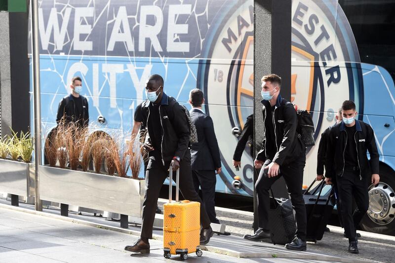 Manchester City's defender Benjamin Mendy and teammates arrive at the team's hotel in Porto. AFP