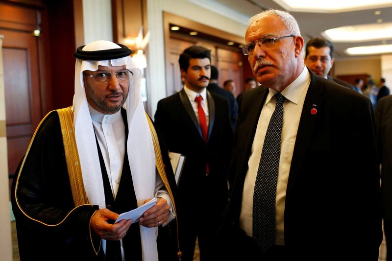 Secretary General of Organization of Islamic Cooperation (OIC) Yousef bin Ahmad Al-Othaimeen chats with Palestinian Foreign Minister Riyad Al-Maliki during an extraordinary meeting of the OIC Executive Committee in Istanbul, Turkey, August 1, 2017. REUTERS/Murad Sezer