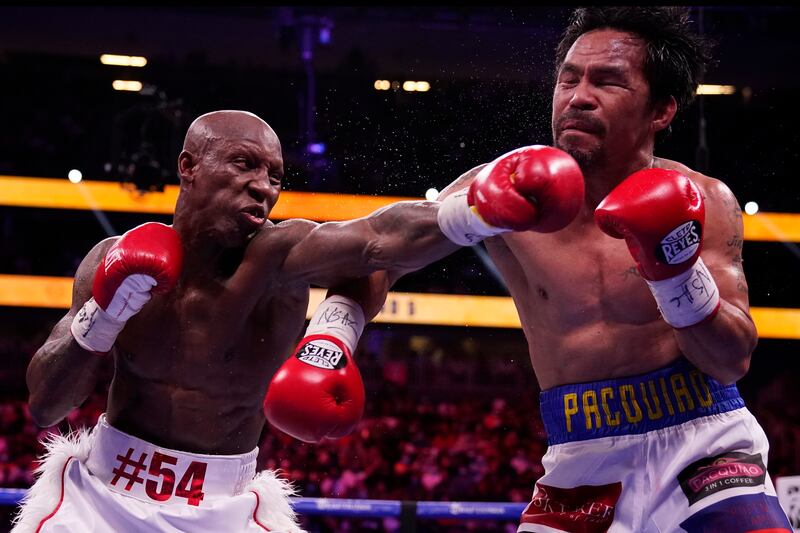 Manny Pacquiao, right, during his defeat against Yordenis Ugas in their WBA welterweight title bout at the T-Mobile Arena in Las Vegas on Saturday, August 21. AP