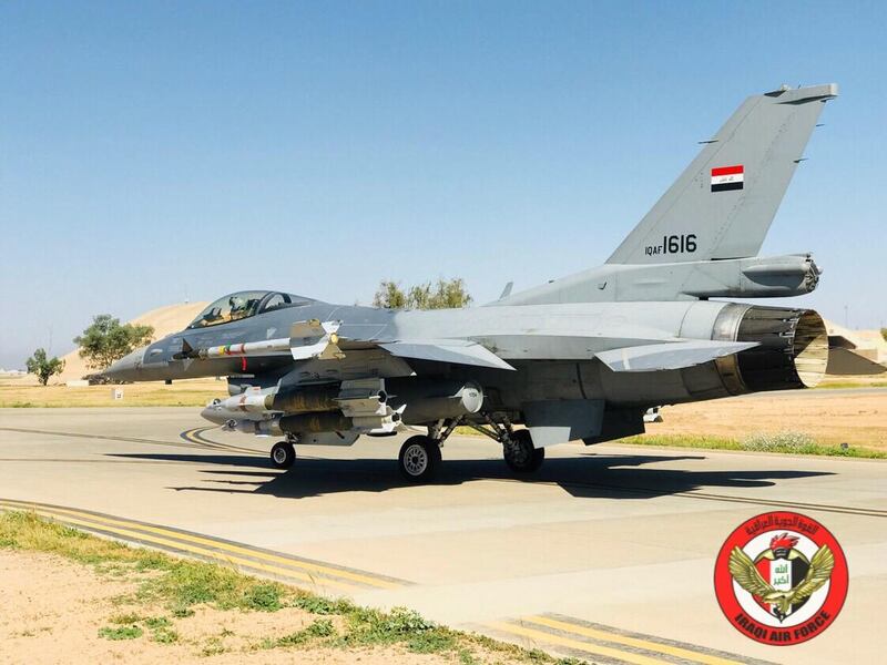 A handout picture provided by the Iraqi Air Force on April 19, 2018 shows a F16 fighter jet at an undisclosed location in Iraq. 
The Iraqi air force on April 19, 2018 carried out a "deadly raid" against positions of the Islamic State group in neighbouring Syria, Prime Minister Haider al-Abadi's office said. The strike against the jihadists was conducted on Abadi's order "because of the danger they pose to Iraqi territory," a statement said.
 / AFP PHOTO / IRAQI AIR FORCE / STRINGER /  RESTRICTED TO EDITORIAL USE - MANDATORY CREDIT "AFP PHOTO /HO/IRAQ AIR FORCE" - NO MARKETING - NO ADVERTISING CAMPAIGNS - DISTRIBUTED AS A SERVICE TO CLIENTS