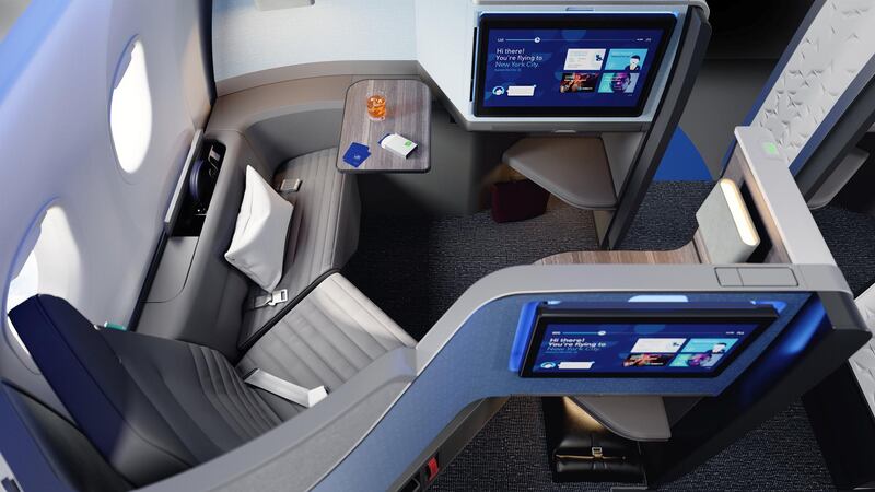 JetBlue's new Mint studios come with an additional seat, a table and the largest bed from any US airline, based on total reclined bed surface area.