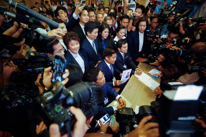 Thai Raksa Chart Party leader Preechapol Pongpanich shows a document nominating Princess Ubolratana Mahidol as candidate for prime minister during election registration at the Election Commission in Bangkok, Thailand. EPA