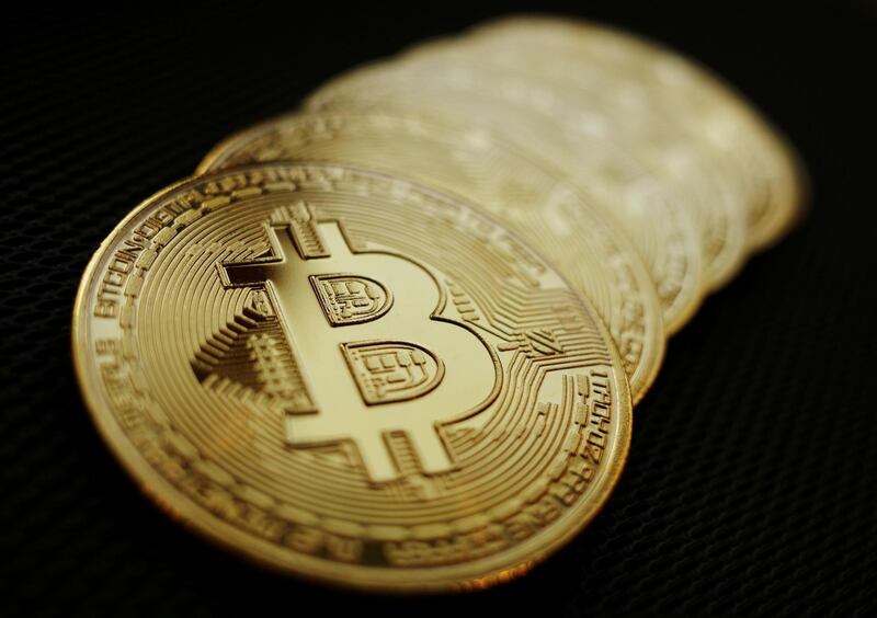 FILE PHOTO: Representations of the Bitcoin cryptocurrency are seen in this illustration picture taken June 7, 2021.   REUTERS/Edgar Su/Illustration/File Photo