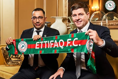 New Al Ettifaq coach Steven Gerrard poses for a photograph with club president Khaled Al Dabal. Ettifaq Media Office via Reuters
