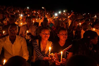 A candlelit vigil at a service marking 25 years since the 1994 Rwanda genocide. A report by historians has found no evidence of French complicity in the slaughter of 800,000 people. AP
