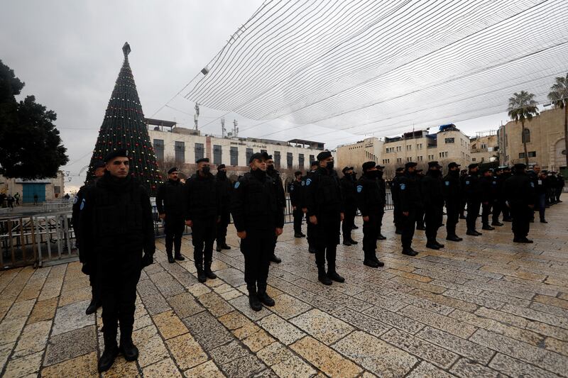 Palestinians have increased security as worshippers come to Bethlehem for Christmas Eve. However, coronavirus restrictions have reduced numbers making the pilgrimage. Reuters