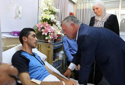 Jordan's King, Abdullah II, meets injured Jordanian armed forces in hospital. Petra Jordan News Agency.