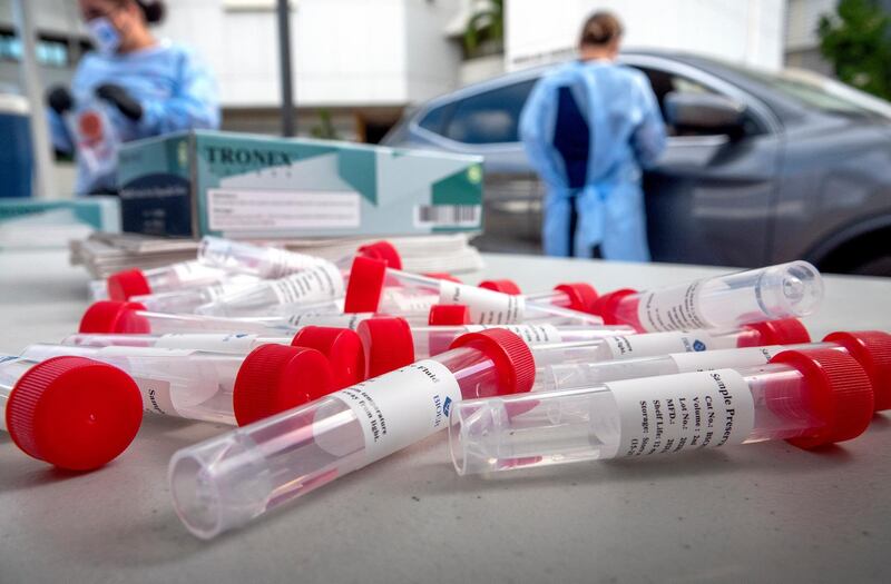 LAB24 team members conduct Covid-19 tests at the Mexican Consulate's parking lot in Miami, Florida, USA. EPA