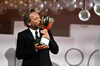 Peter Sarsgaard with the Coppa Volpi for Best Actor he received for the film Memory. AFP