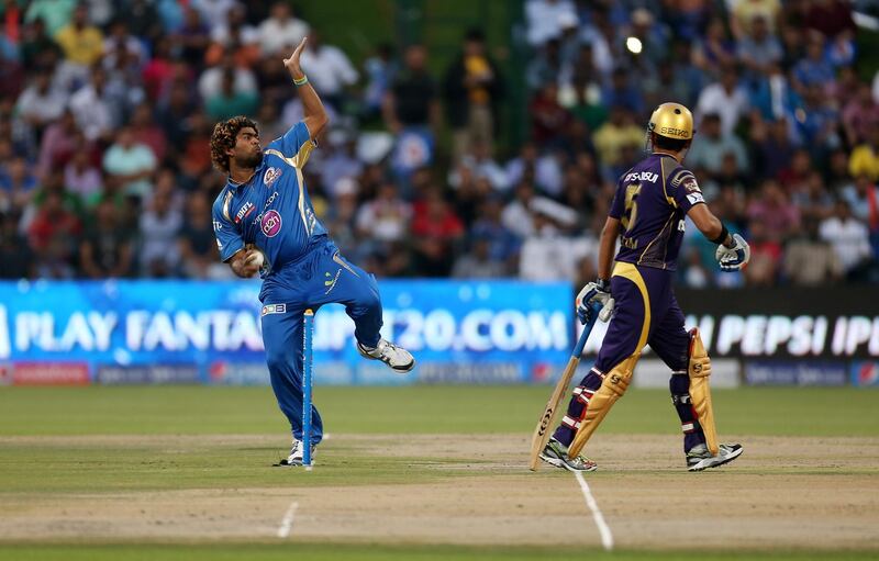 ABU DHABI , UNITED ARAB EMIRATES Ð April 16 , 2014 : Lasith Malinga of Mumbai Indians bowling during the IPL opening match between Mumbai Indians vs Kolkata Knight Riders at Zayed Cricket Stadium in Abu Dhabi. ( Pawan Singh / The National ) For Sports. Story by Osman