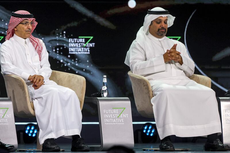 Saudi Arabia's Finance Minister Mohammed Al Jadaan, left, and his Bahraini counterpart Sheikh Salman bin Khalifa Al Khalifa at the annual Future Investment Initiative conference in Riyadh. AFP