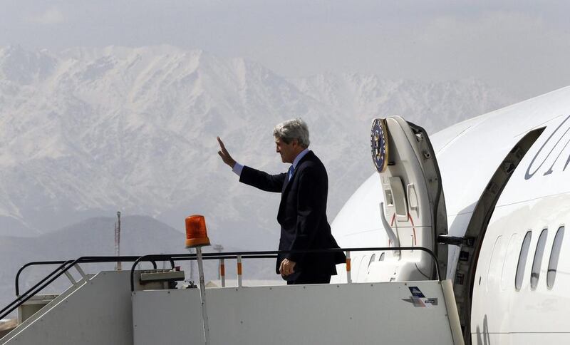 US secretary of state John Kerry departs Kabul after putting on a show of unity with Afghan President Hamid Karzai after he made anti-American comments. Jason Reed / AP



