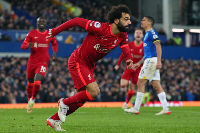 LIVERPOOL, ENGLAND - DECEMBER 01: Mohamed Salah of Liverpool celebrates after scoring their side's third goal during the Premier League match between Everton and Liverpool at Goodison Park on December 01, 2021 in Liverpool, England. (Photo by Alex Livesey / Getty Images)