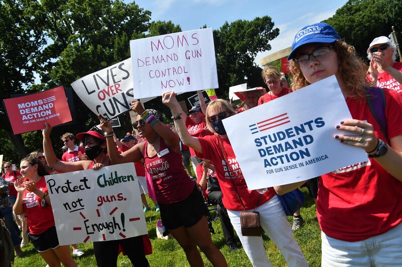 Activists protest near Capitol Hill on Wednesday before the March for Our Lives demonstration, which will take place on Saturday. AFP