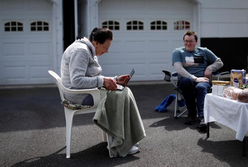 Marcella, Falcomer, who immigrated to the US from Italy in 1955, speaks to relatives on Zoom during her 94th birthday party in West Nyack, New York, USA on April 5, 2020. Reuters