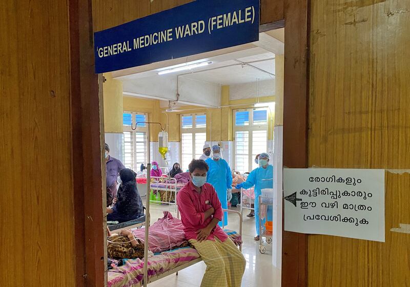 A man looks out from a coronavirus disease ward in the Government Medical College Hospital in Manjeri, Kerala, India. Reuters