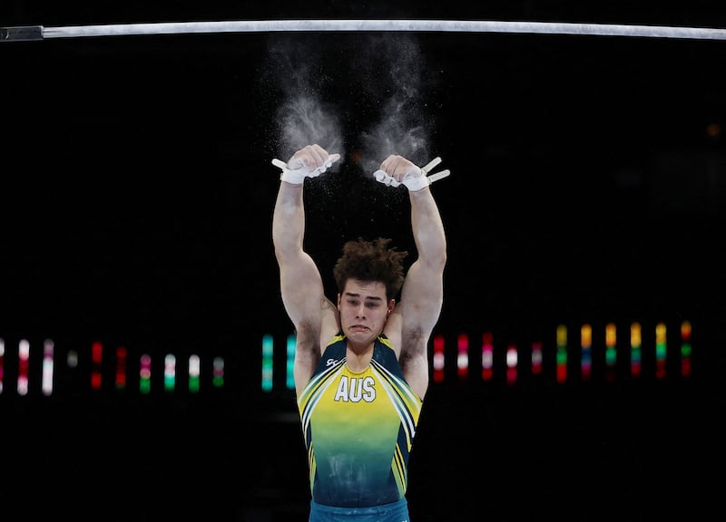 Australia's James Hardy slips off the horizontal bar at the World Artistic Gymnastics Championships in Antwerp, Belgium. Reuters
