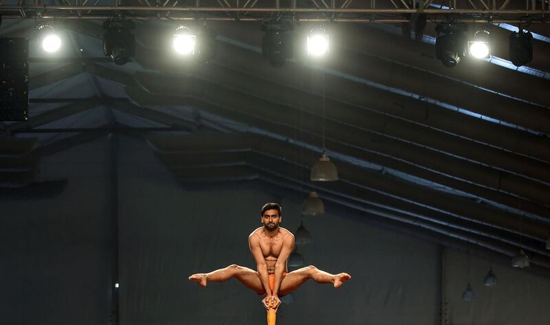 'Malla' means wrestler and 'khamb' means pole. AFP