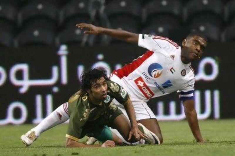 Walid Abbas, in green, joined Al Shabab at the age of nine and will stay at the Dubai club. Mike Young / The National