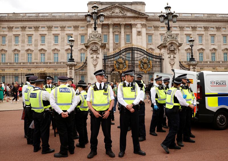 Police officers outside Buckingham Palace during the protest. Reuters