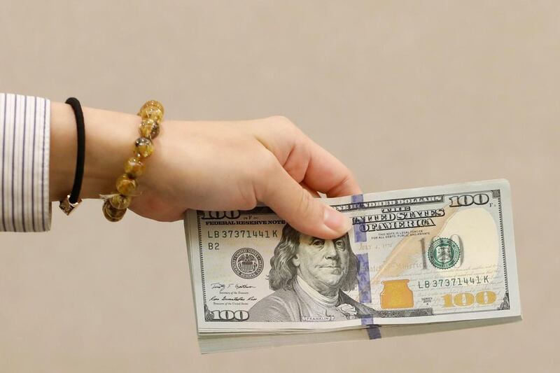 The dollar is benefiting as investors await US data. Tyrone Siu / Reuters