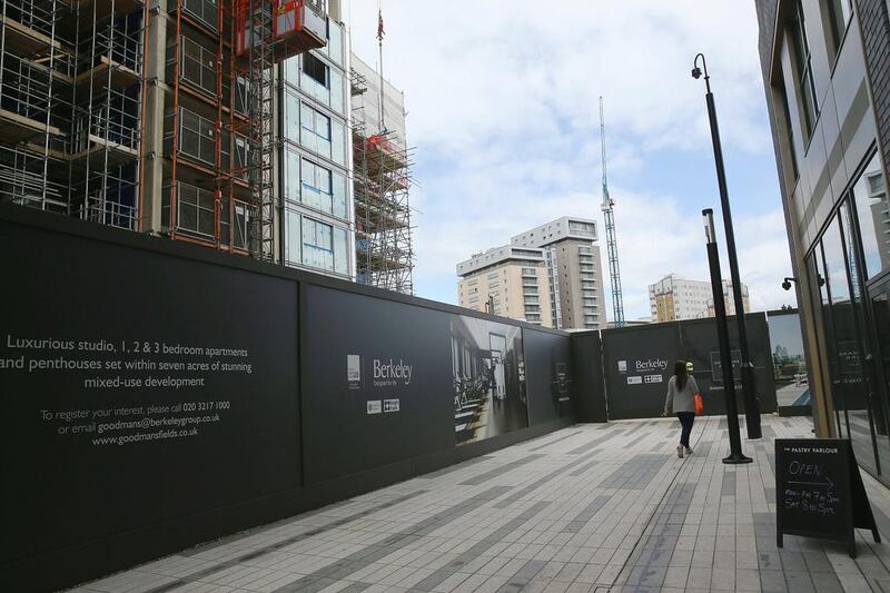 Construction continues on new residential and commercial apartments in London’s East End. The Bank of England has said it plans to use other tools to deal with any housing overheating before raising interest rates. Dan Kitwood / Getty Images