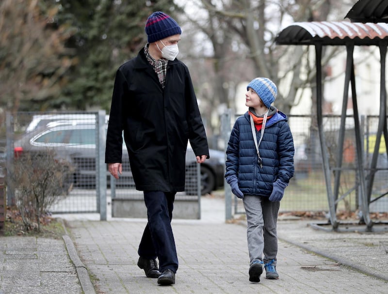 Teacher Michael G. Gromotka and his son Georg. Amid pressure to relax the lockdown, Germany agreed last month to gradually begin reopening schools - then the number of coronavirus cases increased, prompting some regional authorities to put those plans on hold. AP Photo