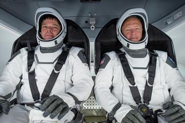 Nasa astronauts Bob Behnken (left) and Doug Hurley at a SpaceX processing facility on Cape Canaveral Air Force Station in Florida, US. EPA