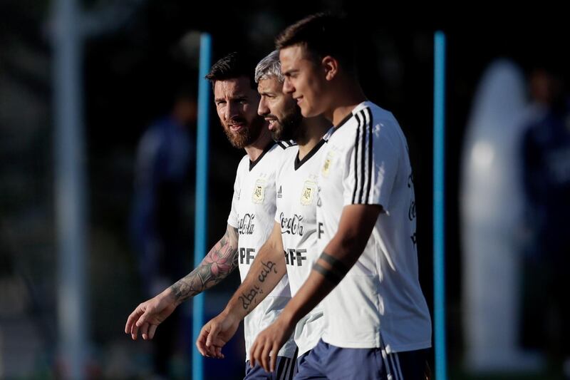 From left: Lionel Messi, Sergio Aguero and Paulo Dybala participate in a training session. EPA