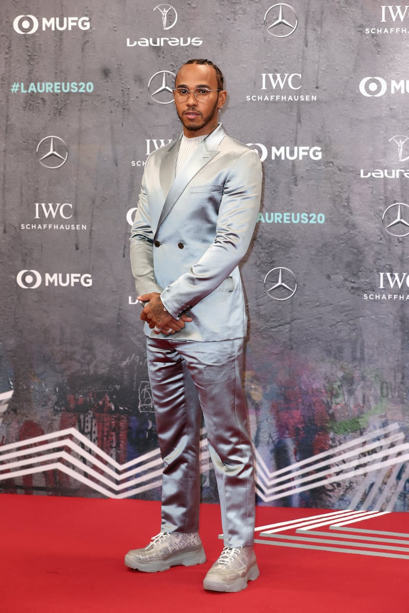 Lewis Hamilton, in a silver Dior suit, attends the Laureus World Sports Awards at Verti Music Hall on February 17, 2020, in Berlin. Getty Images